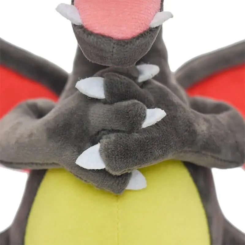 Close-up of Shiny Charizard plush toy showing detailed claws and vibrant colors, ideal for collectors and kids.
