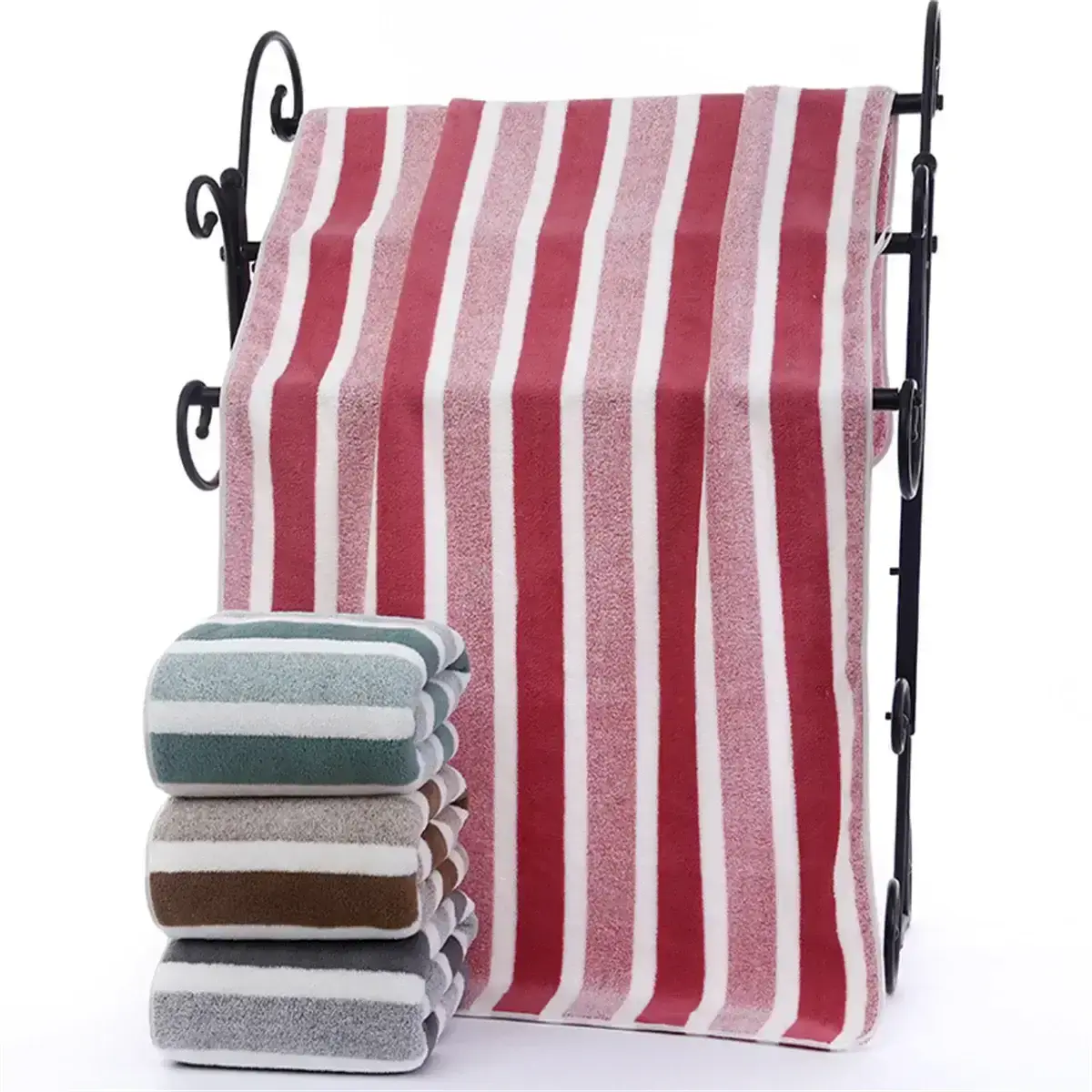 Quick-drying striped towel set in soft fabric, featuring a large bath towel and stacked hand towels for bathroom use.